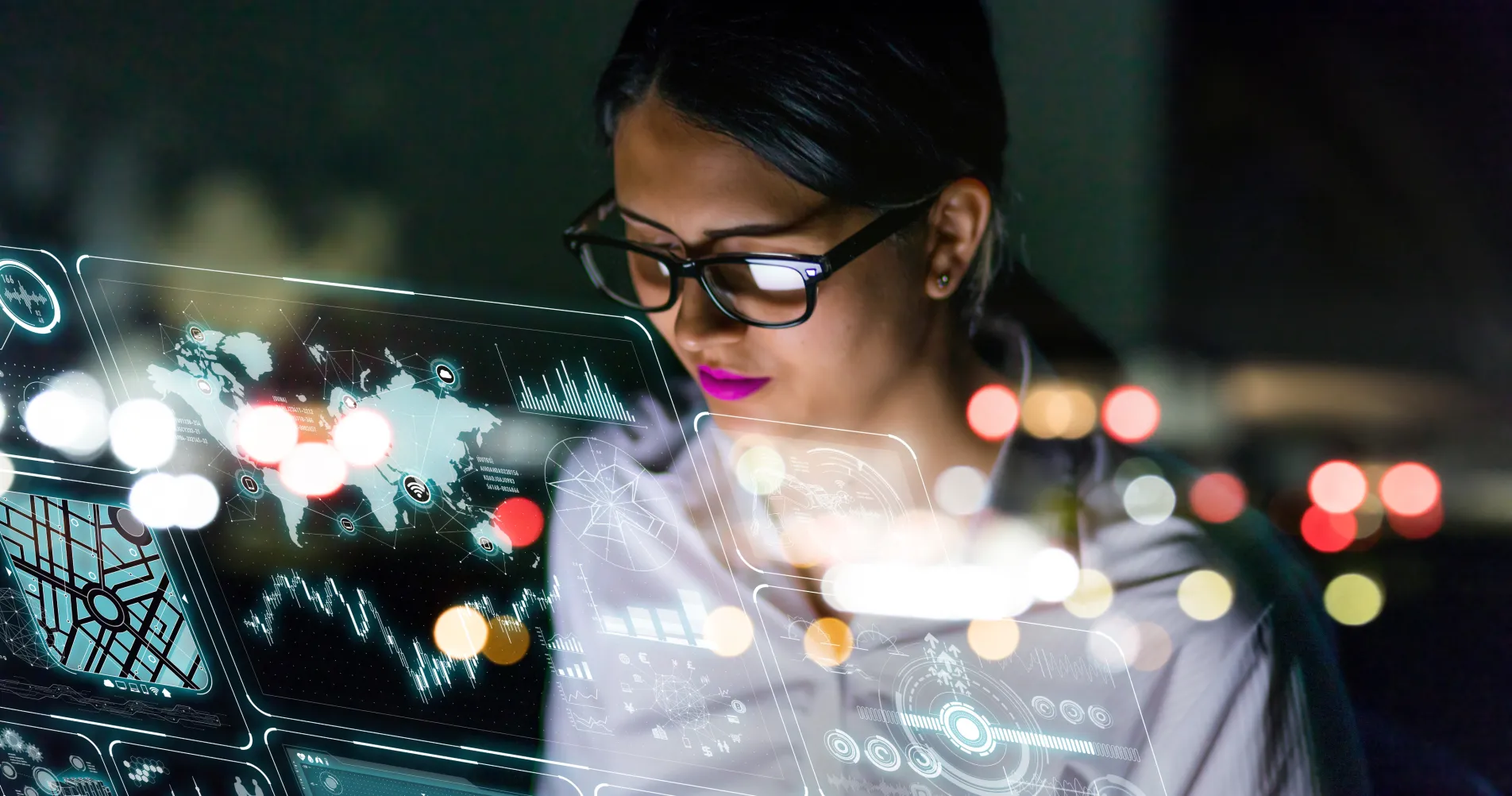 An analyst reviewing traffic data on a transparent display
